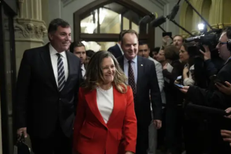 Former MP Freeland at press conference on Election Act violation