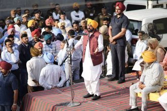 Bhagwant Mann addressing villagers about Punjab development in Dhuri