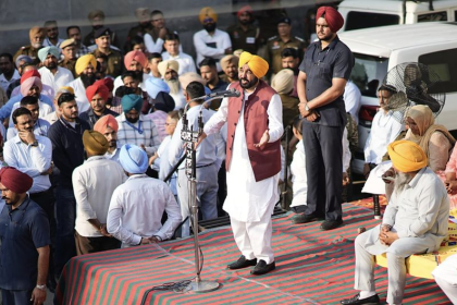 Bhagwant Mann addressing villagers about Punjab development in Dhuri