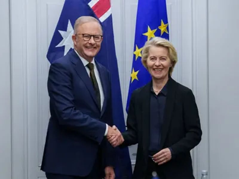 Handshake representing Australia EU trade agreement signing
