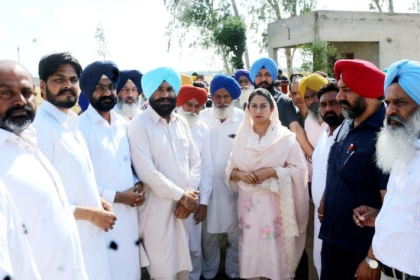 Punjab farmers inspecting crop damage after heavy rains and potholes