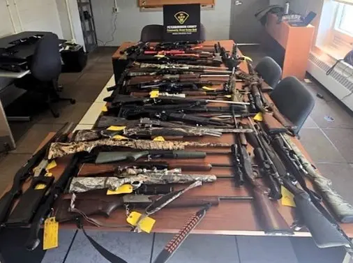 Trent Lakes weapons seizure police display guns and cocaine