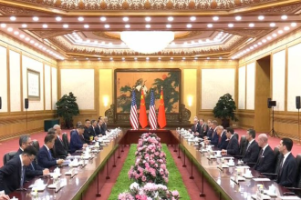 Trump and Xi Jinping meeting during US-China talks in Beijing.