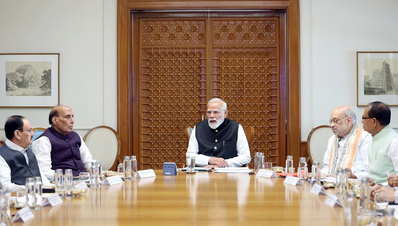 PM Modi addressing cabinet ministers on reducing petrol and unnecessary government expenses