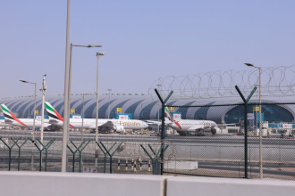 Dubai Airport flight update showing busy terminal and resumed flight operations