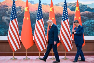 Donald Trump and Xi Jinping discussing Iran war tensions in Beijing summit