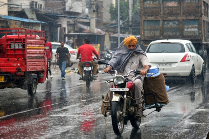 Punjab Weather Rain Alert showing heatwave turning into rain and storm clouds