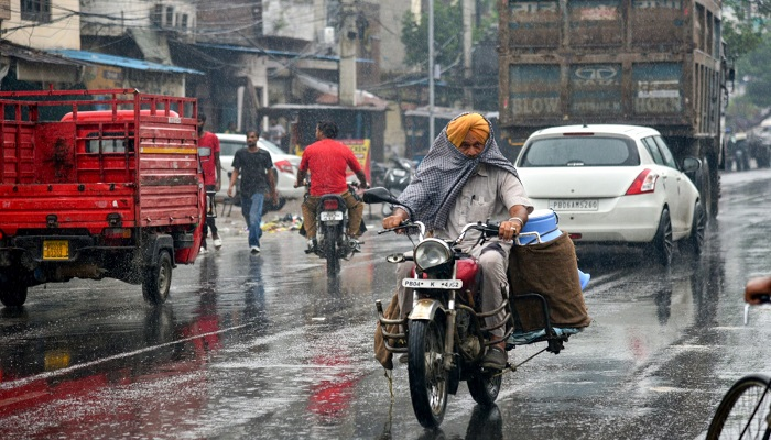 Punjab Weather Rain Alert showing heatwave turning into rain and storm clouds