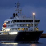 Passengers disembarking cruise ship in Tenerife during Hantavirus evacuation operation
