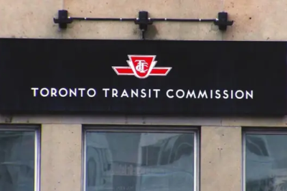 TTC transit workers union agreement meeting in Toronto showing officials and workers signing deal to avoid strike